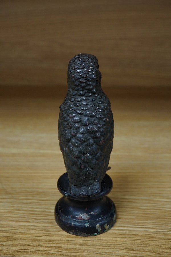 A cold painted bronze car mascot in the form of a kingfisher mounted on a circular socle, 12.5cm high. Condition - fair.